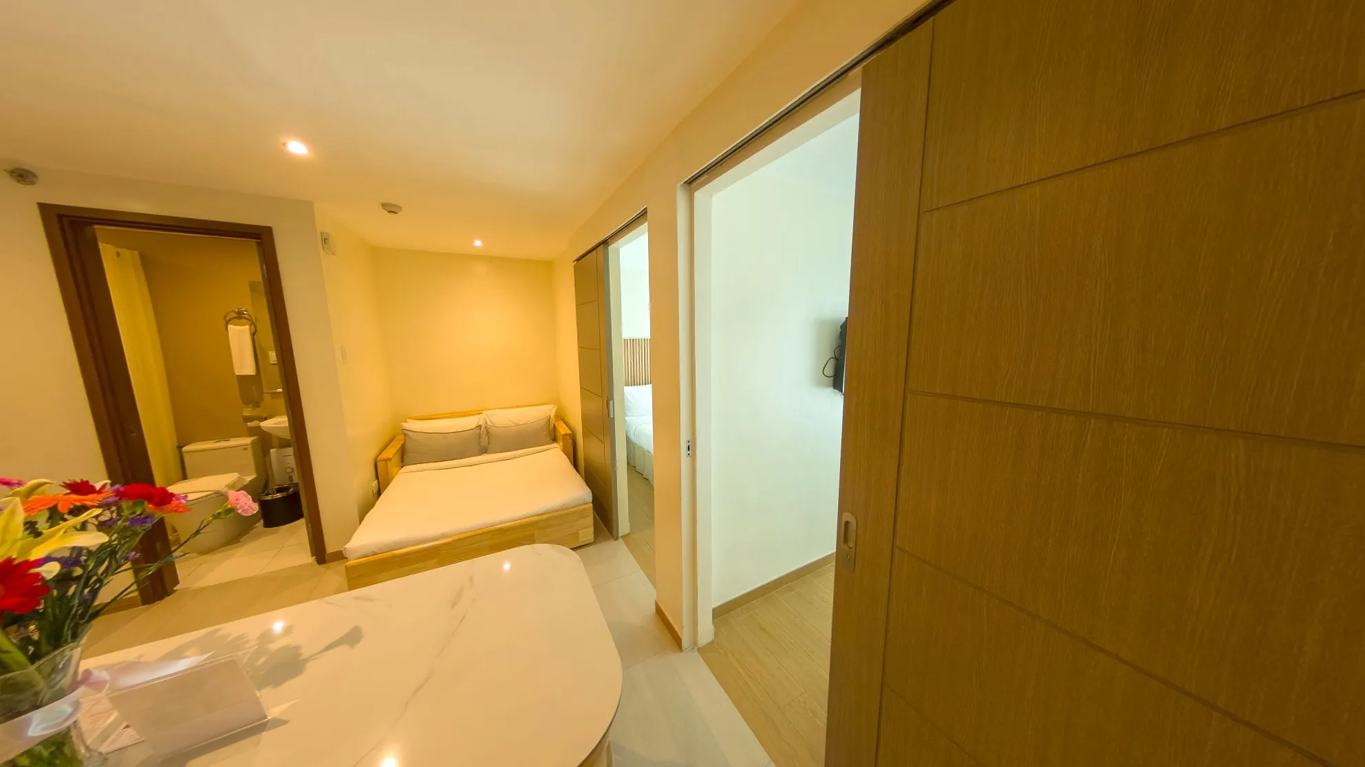 Two Bedroom Standard Room with a sliding door opening to a second bedroom